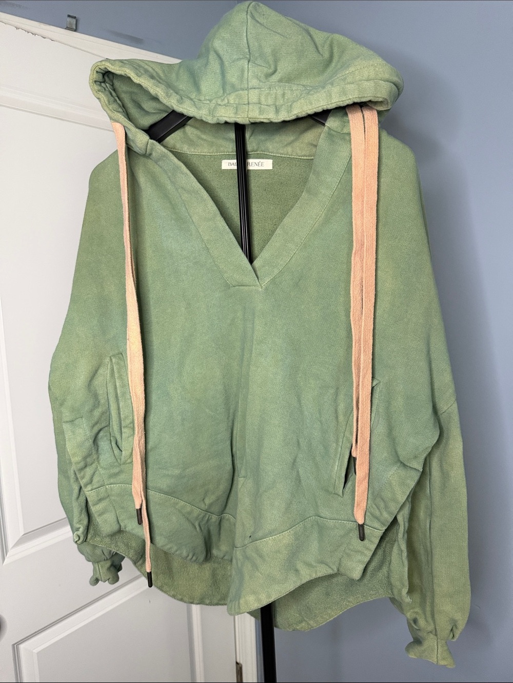 Bailey Renรฉe Sage Green V-Neck Hooded Sweater with Pale Pink Drawstrings